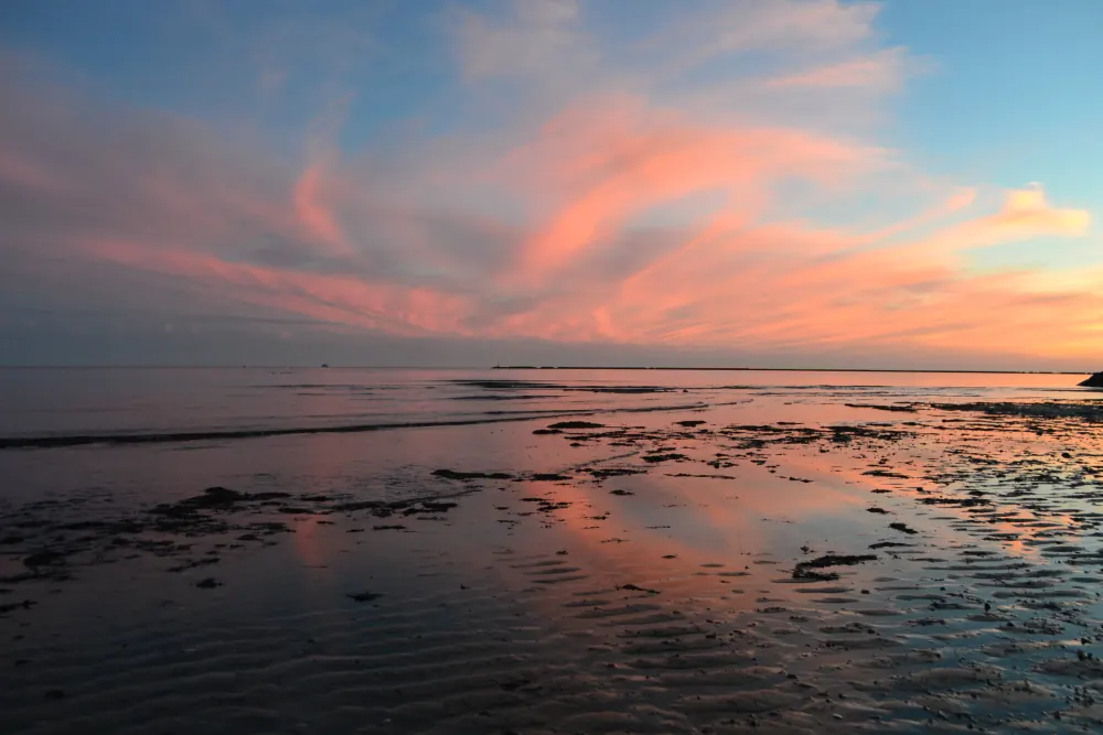 Sunset over the water at Keyes Memorial Beach